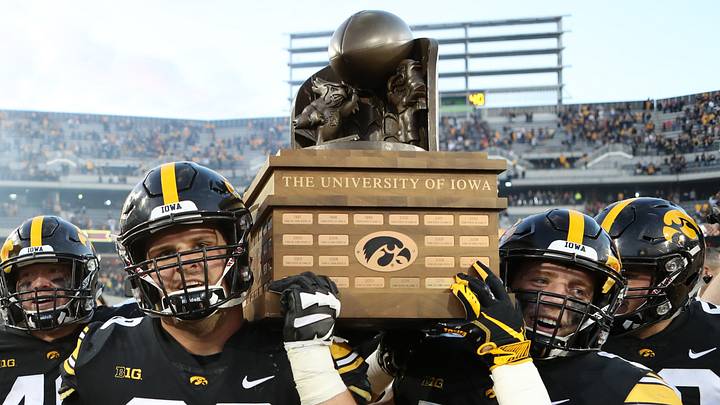 Sep 8, 2018; Iowa City, IA, USA; Iowa Hawkeyes offensive lineman Keegan Render (69) and Iowa Hawkeyes defensive back Jake Gervase (30) carry the Cy-Hawk trophy off the field after defeating the Iowa State Cyclones at Kinnick Stadium. The Hawkeyes beat the Cyclones 13 to 3. Mandatory Credit: Reese Strickland-USA TODAY Sports Sep 8, 2018; Iowa City, IA, USA; Iowa Hawkeyes offensive lineman Keegan Render (69) and Iowa Hawkeyes defensive back Jake Gervase (30) carry the Cy-Hawk trophy off the field after defeating the Iowa State Cyclones at Kinnick Stadium. The Hawkeyes beat the Cyclones 13 to 3. Mandatory Credit: Reese Strickland-USA TODAY Sports