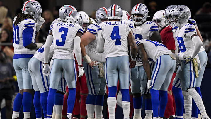 Dallas Cowboys quarterback Dak Prescott huddles with the offense during the game against the Arizona Cardinals. Dallas Cowboys quarterback Dak Prescott huddles with the offense during the game against the Arizona Cardinals.