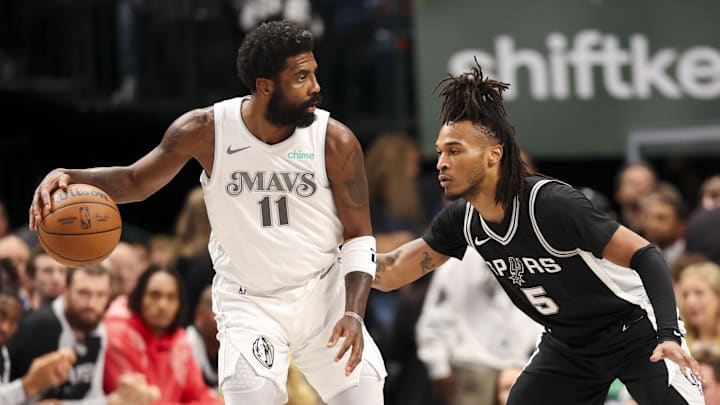 Nov 16, 2024; Dallas, Texas, USA; Dallas Mavericks guard Kyrie Irving (11) controls the ball as San Antonio Spurs guard Stephon Castle (5) defends during the first half at American Airlines Center. Mandatory Credit: Kevin Jairaj-Imagn Images Nov 16, 2024; Dallas, Texas, USA; Dallas Mavericks guard Kyrie Irving (11) controls the ball as San Antonio Spurs guard Stephon Castle (5) defends during the first half at American Airlines Center. Mandatory Credit: Kevin Jairaj-Imagn Images