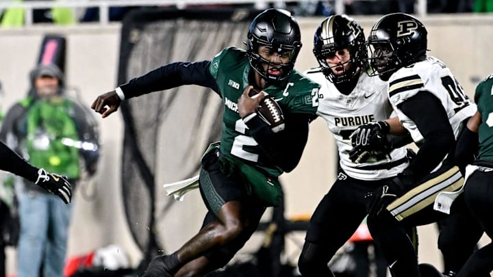 Michigan State's Aidan Chiles runs for a gain against Purdue during the first quarter on Friday, Nov. 22, 2024, at Spartan Stadium in East Lansing.