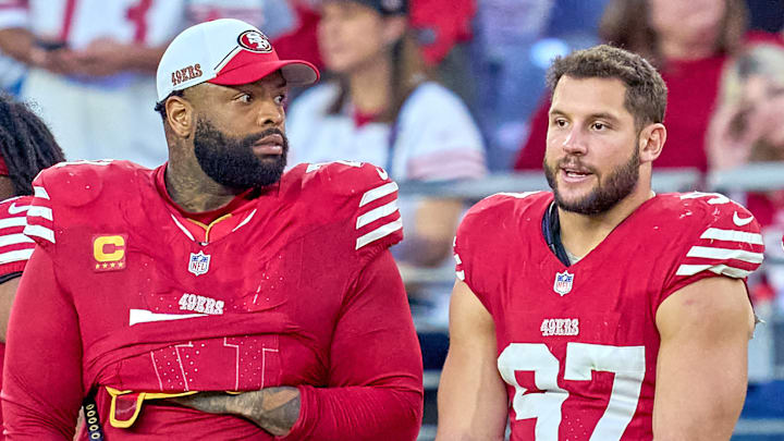 San Francisco 49ers left tackle Trent Williams (L) and defensive end Nick Bosa (R)