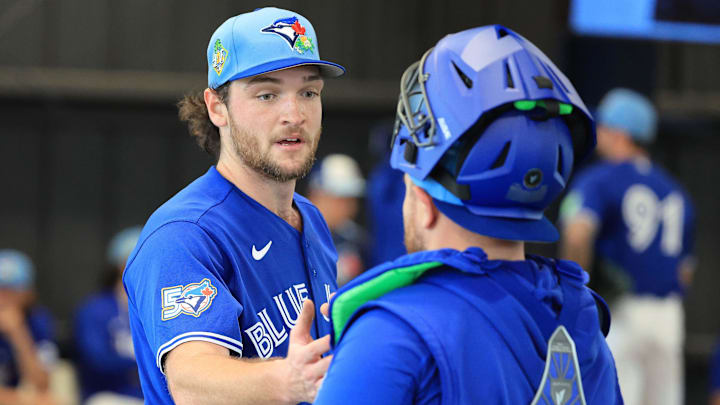 Feb 11, 2026; Dunedin, FL, USA;  Toronto Blue Jays pitcher Trey Yesavage (39) and catcher Alejandro Kirk (30) greet after the bullpen session for spring training practice at Blue Jays Player Development Complex. Mandatory Credit: Kim Klement Neitzel-Imagn Images