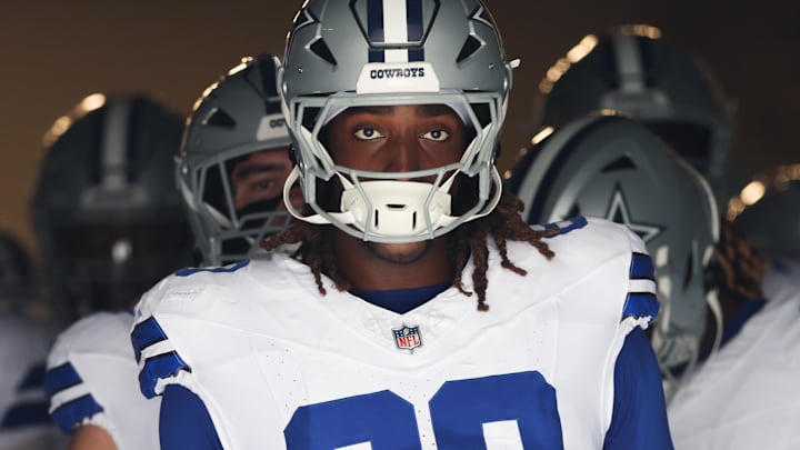 Oct 12, 2025; Charlotte, North Carolina, USA; Dallas Cowboys offensive tackle Tyler Guyton (60) prepares to enter the field prior to the game against the Carolina Panthers at Bank of America Stadium. Man