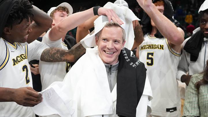 Nov 26, 2025; Las Vegas, NV, USA; Players celebrates with Michigan Wolverines head coach Dusty May after defeating the Gonzaga Bulldogs in the 2025 Players Era Festival championship game at MGM Grand Garden Arena. Nov 26, 2025; Las Vegas, NV, USA; Players celebrates with Michigan Wolverines head coach Dusty May after defeating the Gonzaga Bulldogs in the 2025 Players Era Festival championship game at MGM Grand Garden Arena.