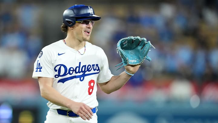Apr 29, 2025; Los Angeles, California, USA; Los Angeles Dodgers first baseman Kiké Hernández (8) pitches in the ninth inning against the Miami Marlins at Dodger Stadium. 