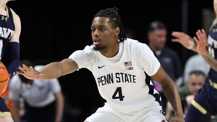 Nov 11, 2025; University Park, Pennsylvania, USA; Penn State Nittany Lions guard Kayden Mingo (4) defends as Navy Midshipmen guard Austin Benigni (1) holds the ball during the first half at Bryce Jordan Center. Mandatory Credit: Matthew O'Haren-Imagn Images Nov 11, 2025; University Park, Pennsylvania, USA; Penn State Nittany Lions guard Kayden Mingo (4) defends as Navy Midshipmen guard Austin Benigni (1) holds the ball during the first half at Bryce Jordan Center. Mandatory Credit: Matthew O'Haren-Imagn Images