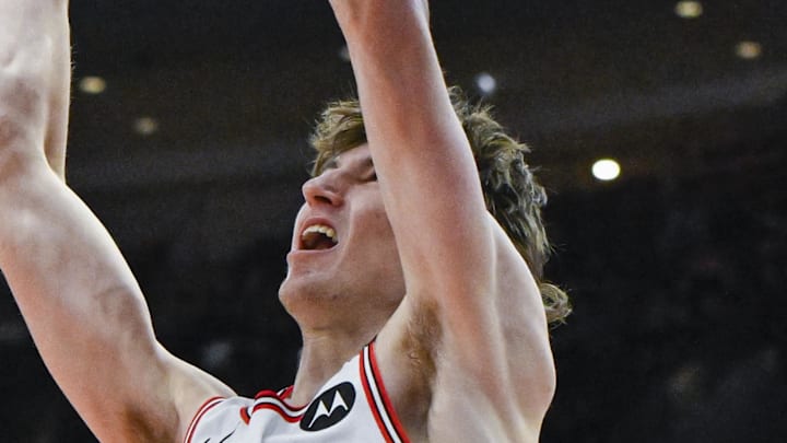 Feb 4, 2025; Chicago, Illinois, USA;   Chicago Bulls forward Matas Buzelis (14) dunks the ball against the Miami Heat during the first half at United Center. Mandatory Credit: Matt Marton-Imagn Images