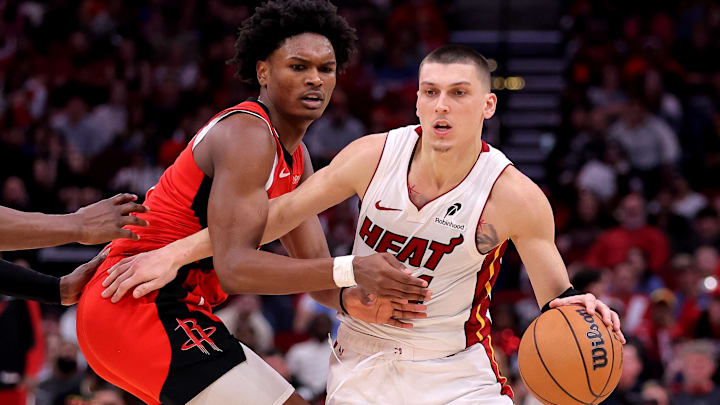 Dec 29, 2024; Houston, Texas, USA; Miami Heat guard Tyler Herro (14) handles the ball against Houston Rockets guard Amen Thompson (1) during the fourth quarter at Toyota Center. Mandatory Credit: Erik Williams-Imagn Images
Dec 29, 2024; Houston, Texas, USA; Miami Heat guard Tyler Herro (14) handles the ball against Houston Rockets guard Amen Thompson (1) during the fourth quarter at Toyota Center. Mandatory Credit: Erik Williams-Imagn Images