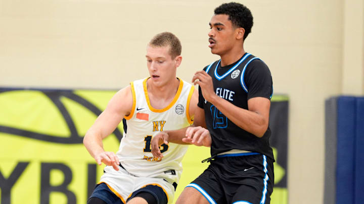 NY Rens Gabriel Hornberger (13) and JL3 Abdul Aziz Olajuwon (15) battle for the ball during the NY Rens and JL3 game in July at the Nike EYBL Peach Jam at Riverview Park Activities Center in North Augusta, South Carolina.