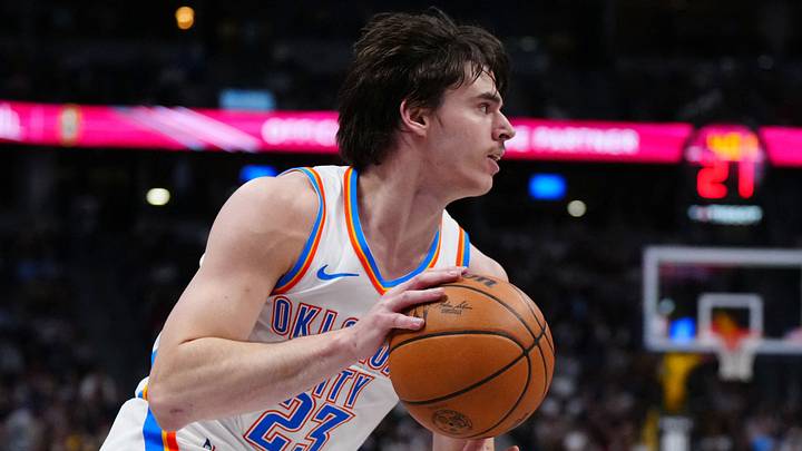 Apr 10, 2026; Denver, Colorado, USA; Oklahoma City Thunder forward Brooks Barnhizer (23) controls the ball in the first quarter against the Denver Nuggets at Ball Arena. Mandatory Credit: Ron Chenoy-Imagn Images Apr 10, 2026; Denver, Colorado, USA; Oklahoma City Thunder forward Brooks Barnhizer (23) controls the ball in the first quarter against the Denver Nuggets at Ball Arena. Mandatory Credit: Ron Chenoy-Imagn Images