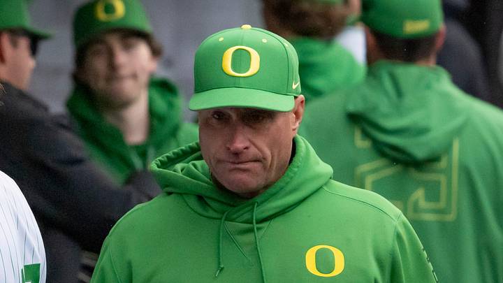 Oregon head coach Mark Wasikowski walks the dugout as the Oregon Ducks host the Minnesota Golden Gophers Saturday, March 15, 2025, at PK Park in Eugene, Ore.
