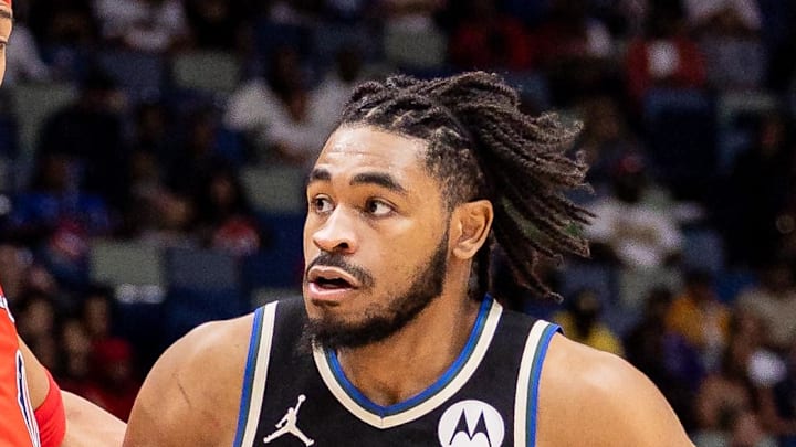 Milwaukee Bucks guard Cam Thomas (24) dribbles against the New Orleans Pelicans during the first half at Smoothie King Center on February 20, 2026.