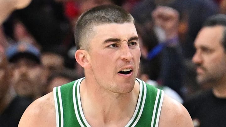 Apr 24, 2026; Philadelphia, Pennsylvania, USA; Boston Celtics guard Payton Pritchard (11) reacts after a three point basket shot against Philadelphia 76ers guard Kelly Oubre Jr. (9) during the second half at Xfinity Mobile Arena. Mandatory Credit: Eric Hartline-Imagn Images