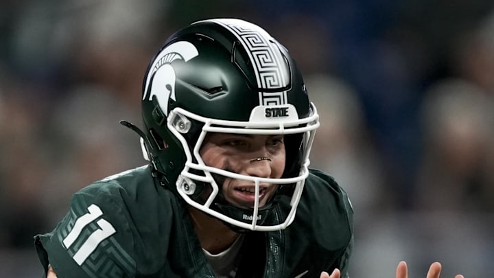 Nov 29, 2025; Detroit, Michigan, USA; Michigan State quarterback Alessio Milivojevic (11) prepares to take a snap in the first quarter against Maryland at Ford Field. Mandatory Credit: Brendan Mullin-Imagn Images Nov 29, 2025; Detroit, Michigan, USA; Michigan State quarterback Alessio Milivojevic (11) prepares to take a snap in the first quarter against Maryland at Ford Field. Mandatory Credit: Brendan Mullin-Imagn Images