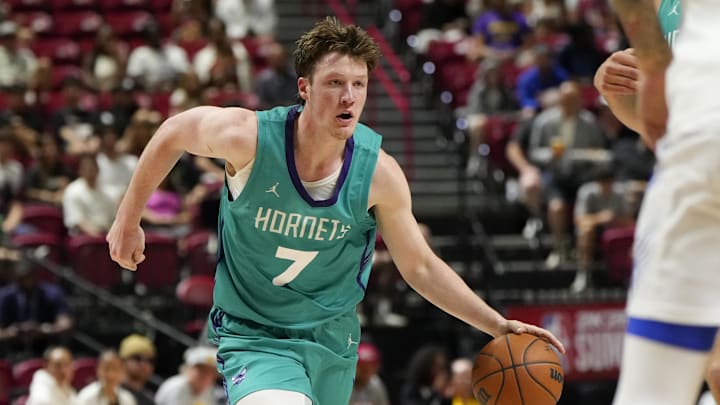 Jul 14, 2025; Las Vegas, NV, USA; Charlotte Hornets guard Kon Knueppel (7) dribbles the ball against the Dallas Mavericks during the second half of a NBA basketball game at the Thomas & Mack Center. Mandatory Credit: Lucas Peltier-Imagn Images