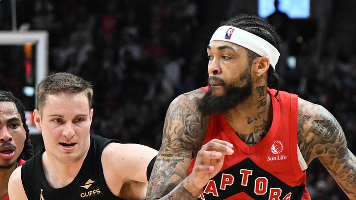 Toronto Raptors forward Brandon Ingram dribbles the ball past Cleveland Cavaliers guard Sam Merrill. Toronto Raptors forward Brandon Ingram dribbles the ball past Cleveland Cavaliers guard Sam Merrill.