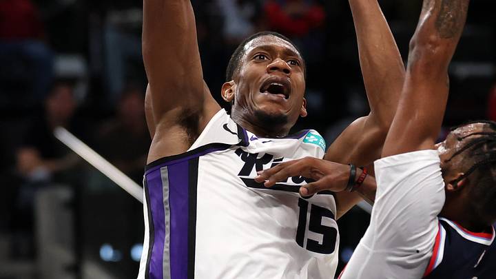 Oct 21, 2026; Inglewood, California, USA;  Sacramento Kings forward/guard De'andre Hunter (15) shoots the ball against Los Angeles Clippers forward Derrick Jones Jr. (5) during the third quarter at Intuit Dome. Mandatory Credit: Kiyoshi Mio-Imagn Images