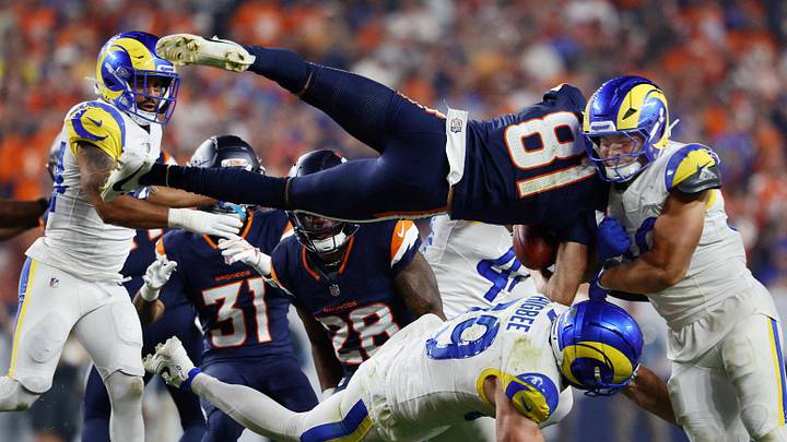 Sep 27, 2026; Denver, Colorado, USA; Los Angeles Rams linebacker Elias Neal (58) and tight end Tyler Higbee (89) tackle Denver Broncos wide receiver Kolbe Katsis (81) during the second half at Empower Field at Mile High. Sep 27, 2026; Denver, Colorado, USA; Los Angeles Rams linebacker Elias Neal (58) and tight end Tyler Higbee (89) tackle Denver Broncos wide receiver Kolbe Katsis (81) during the second half at Empower Field at Mile High.