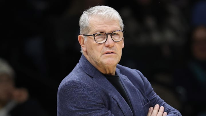 Dec 20, 2025; Brooklyn, New York, USA; UConn Huskies head coach Geno Auriemma stands on the court during the first half against the Iowa Hawkeyes at Barclays Center. Mandatory Credit: Pamela Smith-Imagn Images