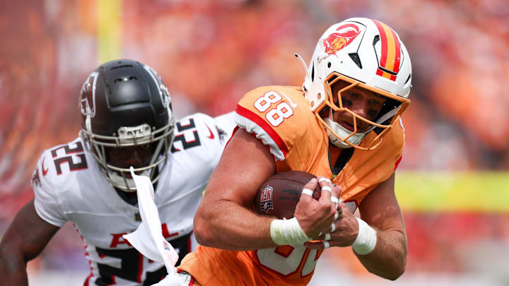 Oct 27, 2024; Tampa, Florida, USA; Tampa Bay Buccaneers tight end Cade Otton (88) runs with the ball against the Atlanta Falcons in the second quarter at Raymond James Stadium. Mandatory Credit: Nathan Ray Seebeck-Imagn Images