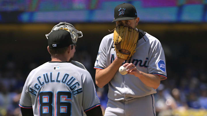 Apr 30, 2025; Los Angeles, California, USA;  Miami Marlins manager Clayton McCullough (86) pulls relief pitcher Anthony Veneziano (59) in the fifth inning against the Los Angeles Dodgers at Dodger Stadium. Mandatory Credit: Jayne Kamin-Oncea-Imagn Images