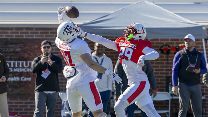 Tight end Nate Boerkircher, of Texas A&M and formerly of Nebraska, battles safety Deshon Singleton of Nebraska for a pass during a Senior Bowl practice. Tight end Nate Boerkircher, of Texas A&M and formerly of Nebraska, battles safety Deshon Singleton of Nebraska for a pass during a Senior Bowl practice.