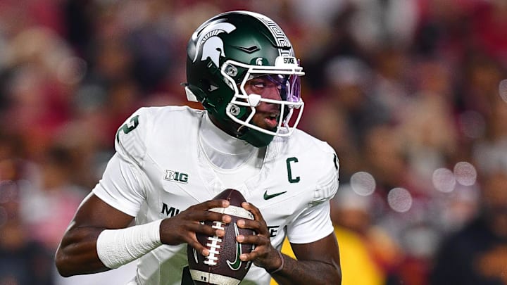 Sep 20, 2025; Los Angeles, California, USA; Michigan State Spartans quarterback Aidan Chiles (2) moves out to pass against the Southern California Trojans during the first half at the Los Angeles Memorial Coliseum. Mandatory Credit: Gary A. Vasquez-Imagn Images