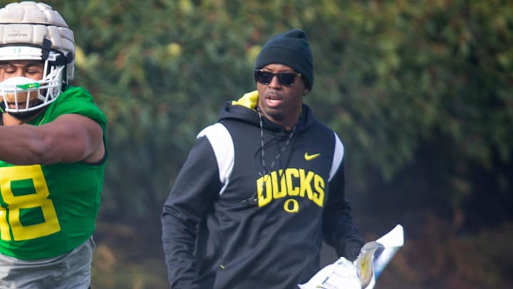 New co-defensive coordinator and safeties coach Chris Hampton, right, joins the first practice of spring for Oregon football as they prepare for the 2023 season.

Eug 031623 Uo Spring Fb 06