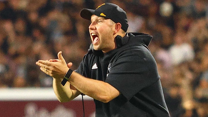 Sep 6, 2025; Starkville, Mississippi, USA; Arizona State Sun Devils head coach Kenny Dillingham reacts during the first quarter against the Mississippi State Bulldogs at Davis Wade Stadium at Scott Field. Mandatory Credit: Petre Thomas-Imagn Images