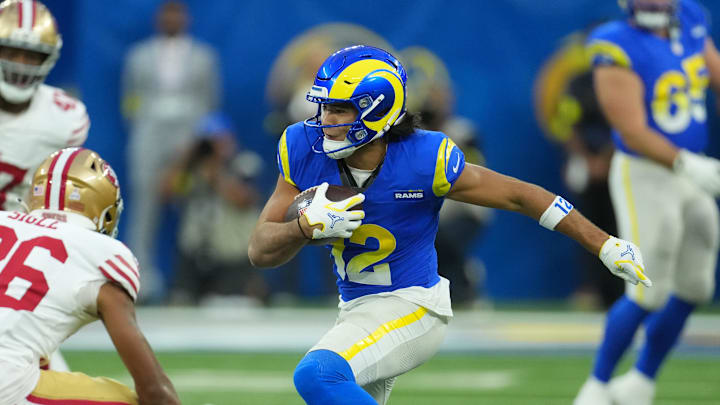 Oct 2, 2025; Inglewood, California, USA; Los Angeles Rams wide receiver Puka Nacua (12) makes a catch against the San Francisco 49ers during the first half at SoFi Stadium. Mandatory Credit: Kirby Lee-Imagn Images