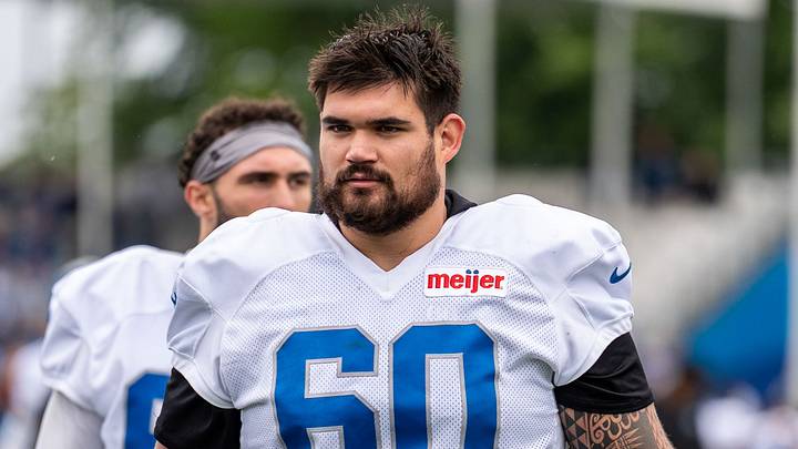 Detroit Lions defensive lineman Aidan Keanaaina (60) walks off the field after practice at Allen Park Performance Center Detroit Lions defensive lineman Aidan Keanaaina (60) walks off the field after practice at Allen Park Performance Center