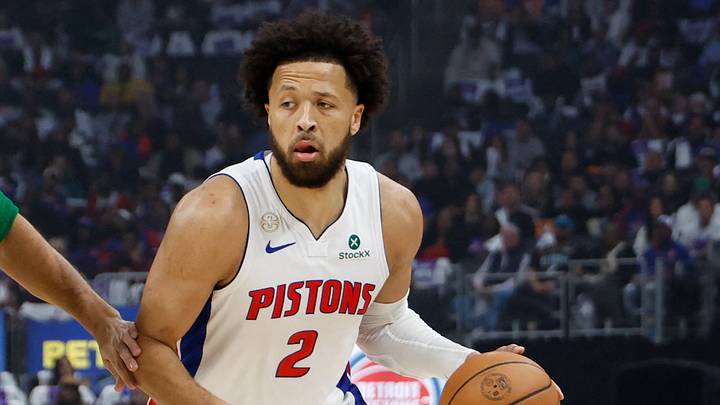 Oct 20, 2026; Detroit, Michigan, USA;  Detroit Pistons guard Cade Cunningham (2) dribbles defended by Boston Celtics forward-guard Jayson Tatum (0) in the first half at Little Caesars Arena.  Mandatory Credit: Rick Osentoski-Imagn Images