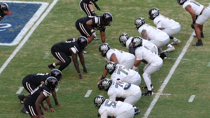 The Oregon Ducks offense at work against the Texas Tech Red Raiders defense during the second half of the 2025 Orange Bowl and quarterfinal game of the College Football Playoff at Hard Rock Stadium. The Oregon Ducks offense at work against the Texas Tech Red Raiders defense during the second half of the 2025 Orange Bowl and quarterfinal game of the College Football Playoff at Hard Rock Stadium.