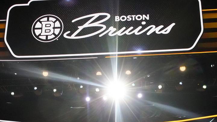 Jun 27, 2025; Los Angeles, California, USA; Adam Sandler announces the seventh overall pick for the Boston Bruins in the first round of the 2025 NHL Draft at Peacock Theater. Mandatory Credit: Kirby Lee-Imagn Images