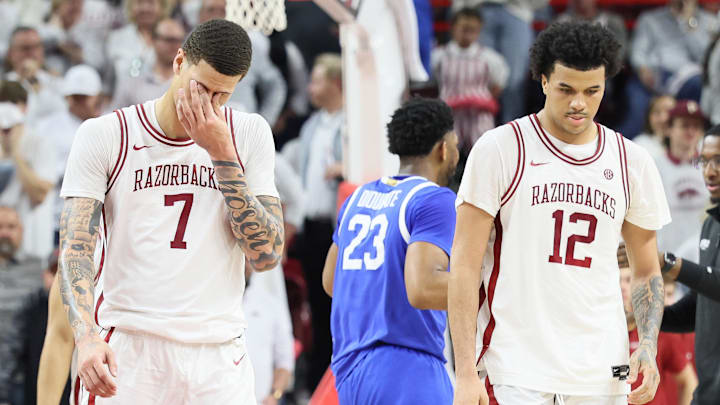 Arkansas Razorbacks forwards Trevon Brazile (7) and Malique Ewin (12) reacts after a call during the second half against the Kentucky Wildcats at Bud Walton Arena. Kentucky won 85-77. Arkansas Razorbacks forwards Trevon Brazile (7) and Malique Ewin (12) reacts after a call during the second half against the Kentucky Wildcats at Bud Walton Arena. Kentucky won 85-77.