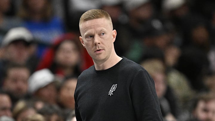 Feb 5, 2026; Dallas, Texas, USA; San Antonio Spurs associate coach Sean Sweeney looks on during the second half against the Dallas Mavericks at the American Airlines Center. Mandatory Credit: Jerome Miron-Imagn Images