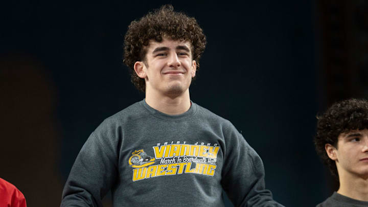 Saint John Vianney’s Anthony Knox stands on the podium after winning the NJSIAA individual wrestling state championships for a fourth time, at Boardwalk Hall in Atlantic City on Friday, March 8, 2025. Saint John Vianney’s Anthony Knox stands on the podium after winning the NJSIAA individual wrestling state championships for a fourth time, at Boardwalk Hall in Atlantic City on Friday, March 8, 2025.