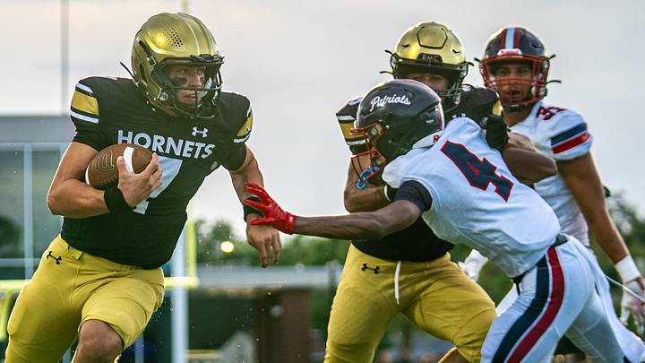 Bishop Moore junior quarterback Blake McCullough runs the ball against Lake Brantley in a preseason Kickoff Classic game on Aug. 14, 2026. He completed 8 of 11 passes for 147 and two touchdowns to guide the Hornets to a 38-21 victory. Bishop Moore junior quarterback Blake McCullough runs the ball against Lake Brantley in a preseason Kickoff Classic game on Aug. 14, 2026. He completed 8 of 11 passes for 147 and two touchdowns to guide the Hornets to a 38-21 victory.