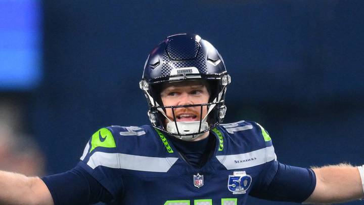 Seattle Seahawks quarterback Sam Darnold calls a play at the line of scrimmage against the San Francisco 49ers. Seattle Seahawks quarterback Sam Darnold calls a play at the line of scrimmage against the San Francisco 49ers.
