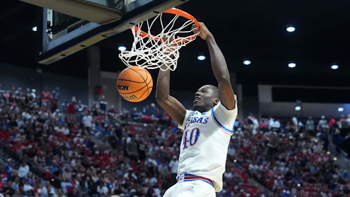 Mar 22, 2026; San Diego, CA, USA; Kansas Jayhawks forward Flory Bidunga (40) dunks against the St. John's Red Storm in the second half during a second round game of the men's 2026 NCAA Tournament at Viejas Arena. Mandatory Credit: Kirby Lee-Imagn Images Mar 22, 2026; San Diego, CA, USA; Kansas Jayhawks forward Flory Bidunga (40) dunks against the St. John's Red Storm in the second half during a second round game of the men's 2026 NCAA Tournament at Viejas Arena. Mandatory Credit: Kirby Lee-Imagn Images