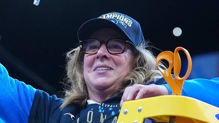 Apr 5, 2026; Phoenix, AZ, USA; UCLA Bruins head coach Cori Close cuts down the net after defeating the South Carolina Gamecocks during the National Championship game of the women's 2026 NCAA Tournament at Mortgage Matchup Center. Mandatory Credit: Kirby Lee-Imagn Images Apr 5, 2026; Phoenix, AZ, USA; UCLA Bruins head coach Cori Close cuts down the net after defeating the South Carolina Gamecocks during the National Championship game of the women's 2026 NCAA Tournament at Mortgage Matchup Center. Mandatory Credit: Kirby Lee-Imagn Images