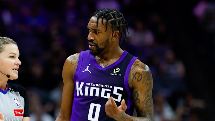 Feb 6, 2026; Sacramento, California, USA; Sacramento Kings guard Malik Monk (0) argues a call with referee Jenna Schroeder during the fourth quarter against the Los Angeles Clippers at Golden 1 Center.