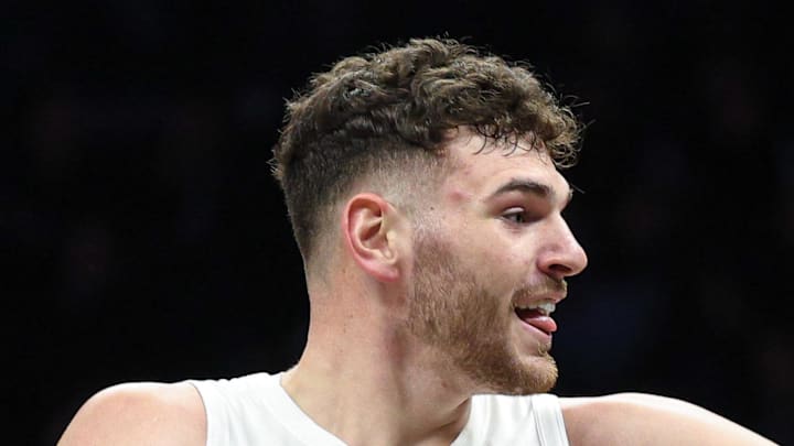 Portland Trail Blazers center Donovan Clingan reacts after making a basket. Portland Trail Blazers center Donovan Clingan reacts after making a basket.