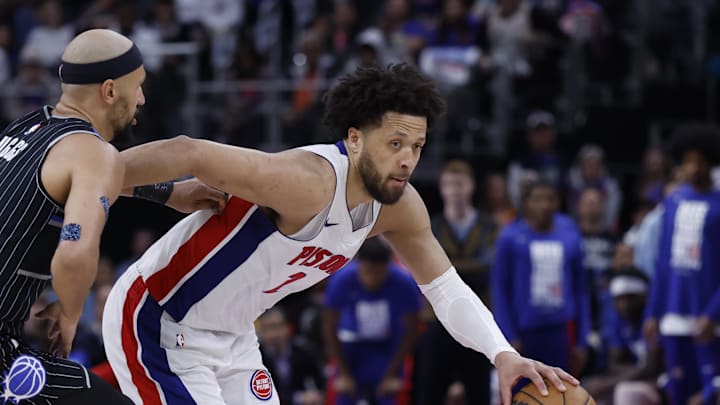 Apr 29, 2026; Detroit, Michigan, USA; Detroit Pistons guard Cade Cunningham (2) dribbles defended by Orlando Magic guard Jalen Suggs (4) in the second half during game five of the first round of the 2026 NBA Playoffs at Little Caesars Arena. Mandatory Credit: Rick Osentoski-Imagn Images