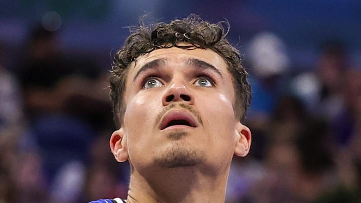 Apr 6, 2026; Orlando, Florida, USA; Detroit Pistons guard Javonte Green (31), guard Ausar Thompson (9) and Orlando Magic forward Tristan da Silva (23) look for the rebound during the second half at Kia Center. Mandatory Credit: Mike Watters-Imagn Images