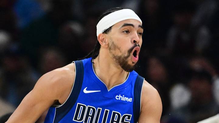 Mar 15, 2026; Cleveland, Ohio, USA; Dallas Mavericks guard Ryan Nembhard (9) celebrates after hitting a three point basket against the Cleveland Cavaliers during the second half at Rocket Arena. Mandatory Credit: Ken Blaze-Imagn Images
