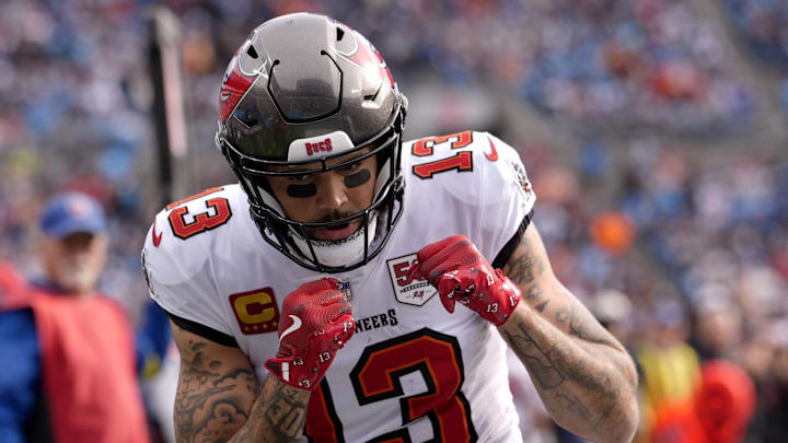 Dec 21, 2025; Charlotte, North Carolina, USA; Tampa Bay Buccaneers wide receiver Mike Evans (13) reacts a touchdown during the first half against the Carolina Panthers at Bank of America Stadium. 
