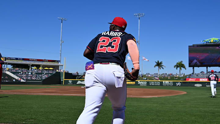 Feb 24, 2026; North Port, Florida, USA; Atlanta Braves center fielder Michael Harris (23) and first baseman Matt Olson (28) run onto the field before the game against the Detroit Tigers during spring training at CoolToday Park. Mandatory Credit: Jonathan Dyer-Imagn Images