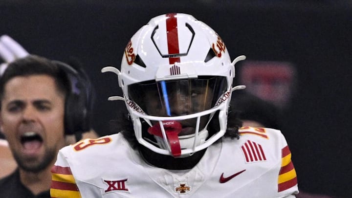 Dec 7, 2024; Arlington, TX, USA; Arizona State Sun Devils wide receiver Malik McClain (12) and Iowa State Cyclones defensive back Ta'Shawn James (19) during the game between the Iowa State Cyclones and the Arizona State Sun Devils at AT&T Stadium. Mandatory Credit: Jerome Miron-Imagn Images