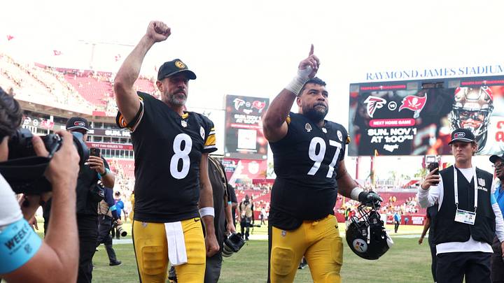 Aaron Rodgers and Cameron Heyward celebrate after the game against the Tampa Bay Buccaneers. Aaron Rodgers and Cameron Heyward celebrate after the game against the Tampa Bay Buccaneers.
